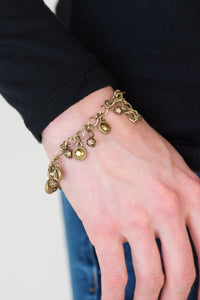 Stratosphere Shimmer Brass Bracelet - Paparazzi Accessories - Bella Fashion Accessories LLC